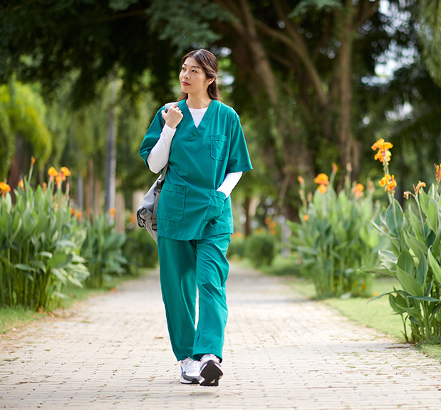 Medical Intern Walking to Hospital